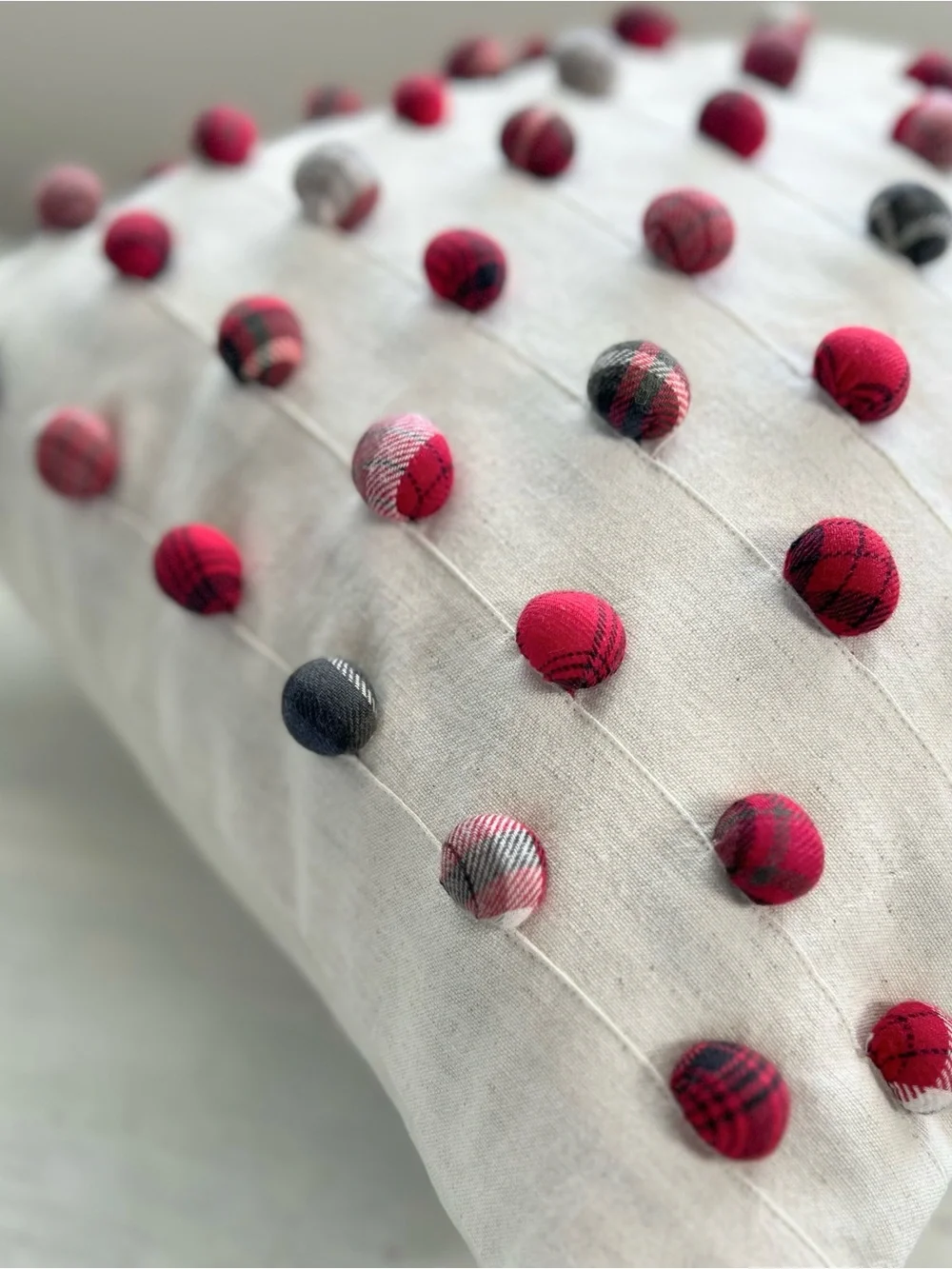 Pottery Barn Cream Pillow with Red and Navy Pom Dots
